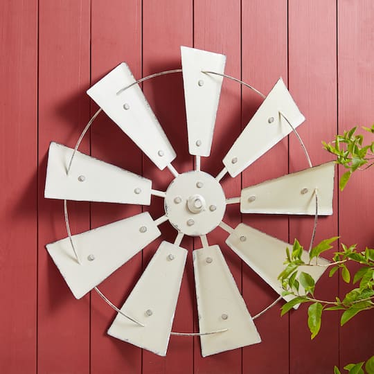 Glitzhome® 22" Beige Metal Wind Spinner Wall Décor